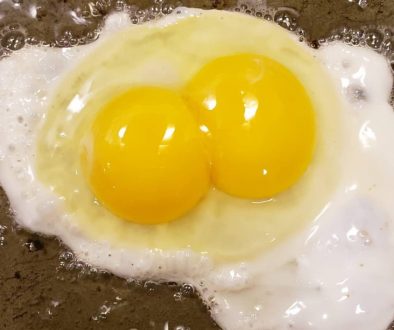 frying eggs sunny side up