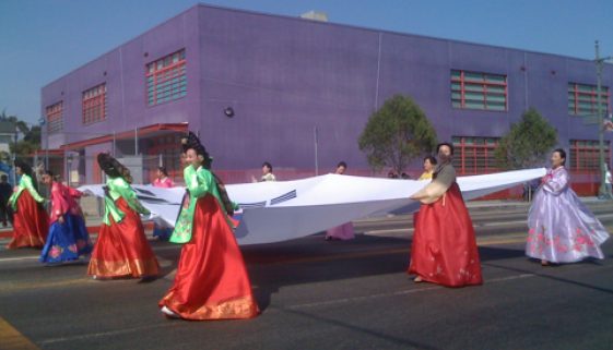 Korean Women Carrying Flag in LA Koreatown Parade