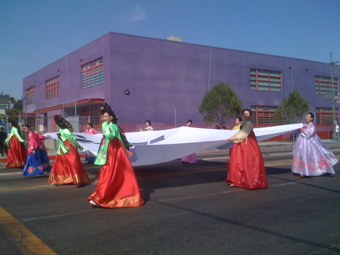 Korean Women Carrying Flag in LA Koreatown Parade